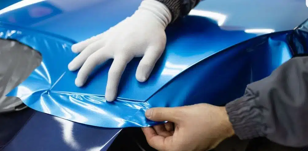 Car with vinyl wrap demonstrating protection and lifespan of vinyl wrap over years